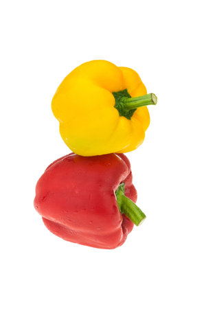Red and yellow sweet pepper isolated on white backgroundの写真素材