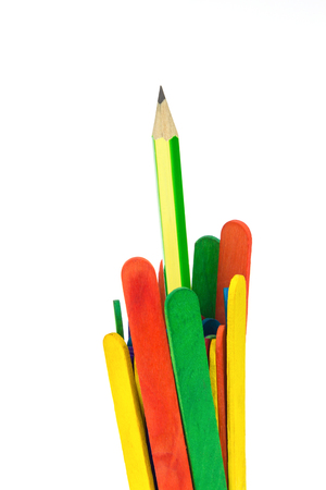 colorful wood ice-cream stick and pencil  on white backgroundの写真素材