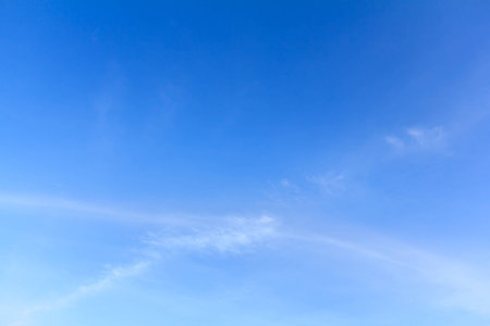 blue sky background with white cloudsの写真素材