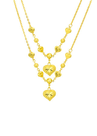 Golden heart with necklace chain  isolated on white backgroundの写真素材