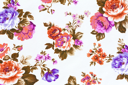 Fragment of  colorful retro tapestry textile pattern with floral ornament useful as backgroundの写真素材