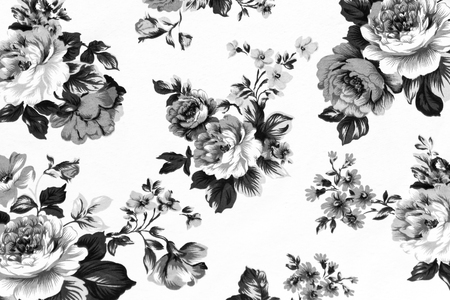 Fragment of black white retro tapestry textile pattern with floral ornament useful as backgroundの写真素材