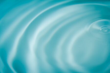 Blue wave pool  with sun reflectionsの写真素材