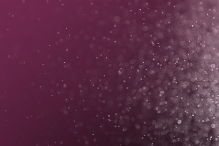 abstract purple light bokeh backgroundの写真素材