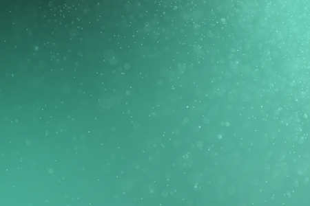 Abstract Green light bokeh backgroundの写真素材