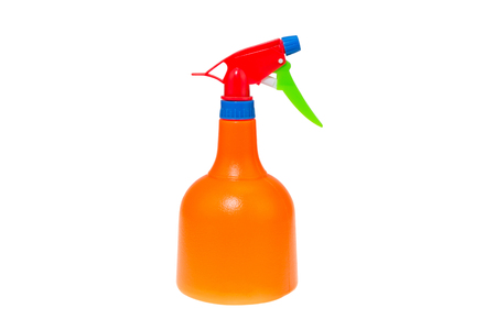 Orange spray bottle  isolated on white backgroundの写真素材