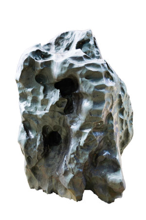 isolated black rock with smooth edges from the river removed backgroundの写真素材