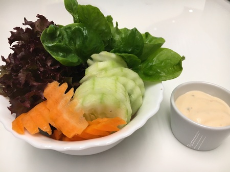 Vegetables salad in a small bowlの素材