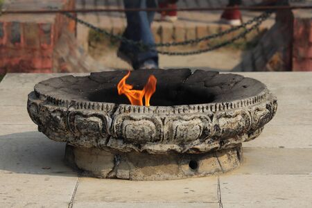 Eternal flame of peace and harmony at lumbini ,Nepal .の写真素材