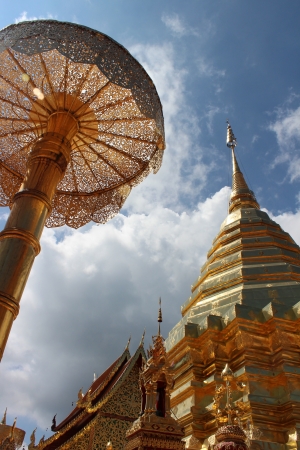 golden temple and golden umbrella in blue sky dayのeditorial素材