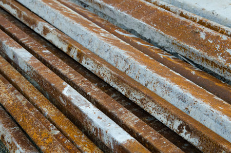 The outdoor steel bar is rusty to wait for building constructionの写真素材