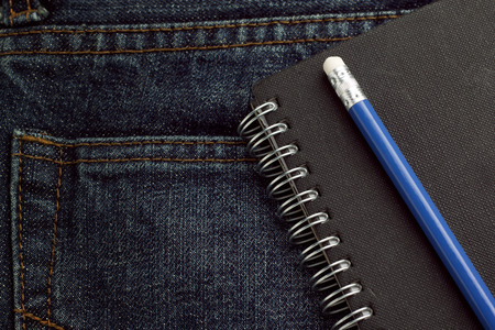 brochure in the back pocket of jeansの写真素材