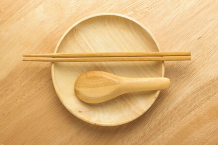 Chopsticks with wooden bowlの写真素材