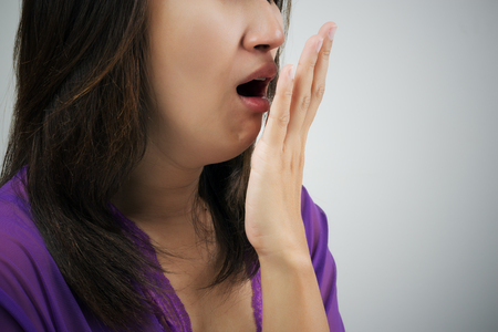 Yawning tired womanの写真素材