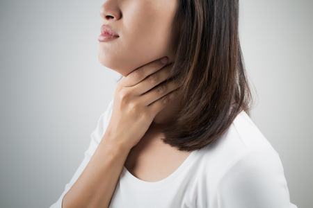 Sore throat womanの写真素材