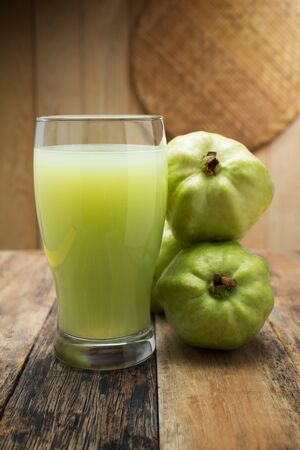 Guava juice on woodenの写真素材