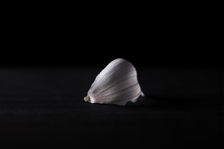 Garlic cloves on wooden vintage background.の写真素材