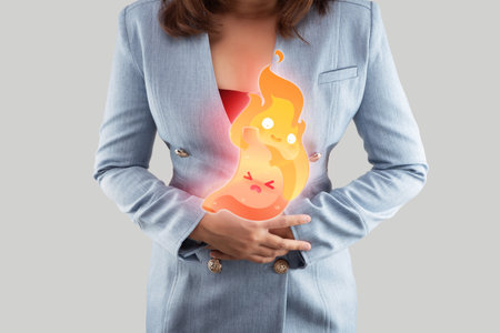 This image shows the symptoms of acid reflux and heartburn, using cartoon characters on a photo to help explain things more clearly and simply.の写真素材
