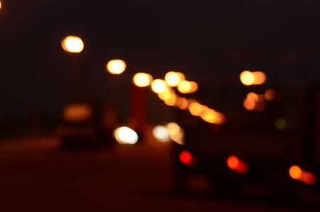 Beautiful blur and bokeh images. christmas light night,abstract circular bokeh background.bokeh lights and car lights illuminate the streets.の写真素材