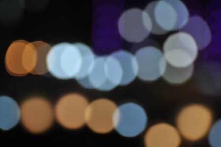 Beautiful bokeh lights at the airport road.Photo of bokeh lights and car lights illuminate the streets.christmas light night,abstract circular bokeh background.の写真素材