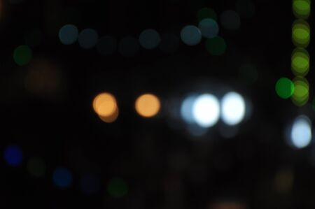 Beautiful bokeh lights at the airport road.Photo of bokeh lights and car lights illuminate the streets.christmas light night,abstract circular bokeh background.の写真素材