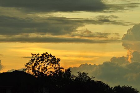 Golden sky with beautiful clouds Beautiful clouds when there is a beam from the sun.の写真素材