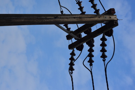 Power transmission system With the sky and the beautiful clouds in bright days. Power poles and...
