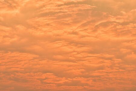 Sunset with golden sky Sun rise In the morning at the top of the hill. Mountain with sky and...