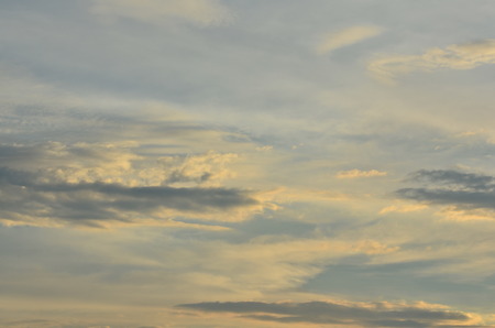 Sunset with golden sky Sun rise In the morning at the top of the hill. Mountain with sky and beautiful clouds in bright days.の写真素材
