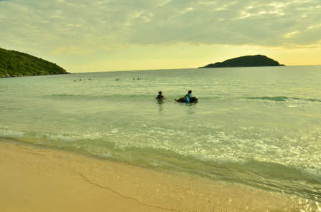 people relaxing on the beach.Tourists come and play the sea. Beautiful sand beach in thailandのeditorial素材