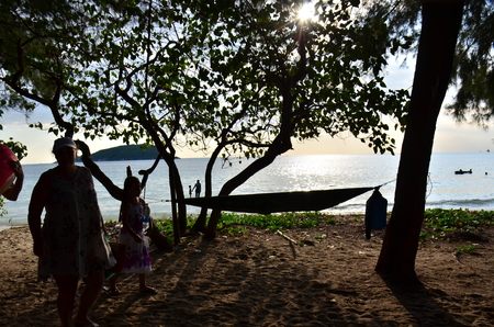 Beautiful sunset above the sea.Gold Sunset, sea and clouds. Beautiful golden orange sunset over the ocean. The sun sets turning the sky yellow, orange & red tones & reflects in the ocean.のeditorial素材