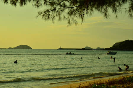 Beautiful sunset above the sea.Gold Sunset, sea and clouds. Beautiful golden orange sunset over the ocean. The sun sets turning the sky yellow, orange & red tones & reflects in the ocean.のeditorial素材