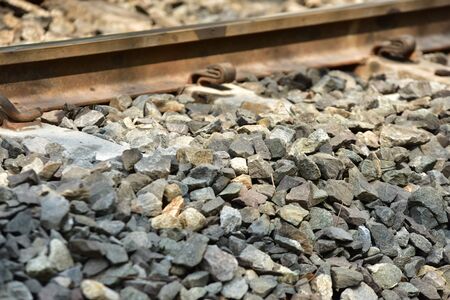 The length of the railway track.Railroad close-up on a pebble at a train station