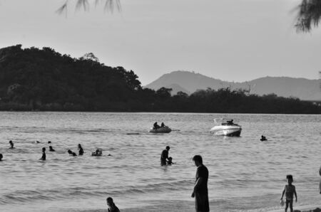 Beautiful sunset above the sea.Gold Sunset, sea and clouds. Beautiful golden orange sunset over the ocean. The sun sets turning the sky yellow, orange & red tones & reflects in the ocean.のeditorial素材