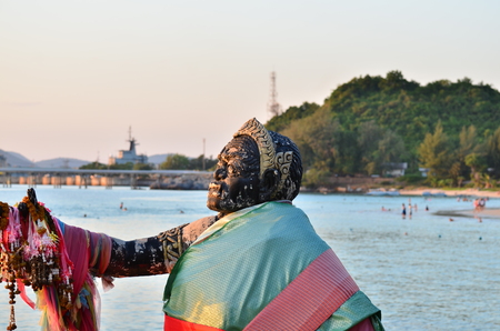 Beautiful sunset above the sea.Gold Sunset, sea and clouds. Beautiful golden orange sunset over the ocean. The sun sets turning the sky yellow, orange & red tones & reflects in the ocean.の写真素材