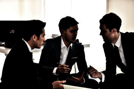 stressful situation.Young businessmen stressed with irrelevant work. And try to find a way to solve problems. It was a mistake. In a stressful situationの写真素材