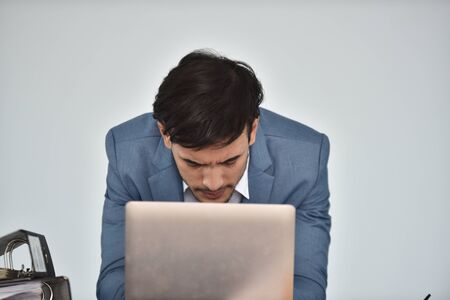 Young businessman Stress from problematic workの写真素材