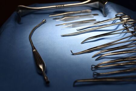 Surgical light in the operating room. Preparation for the beginning of surgical operation with a cut. Team surgeon at work in operating roomの写真素材