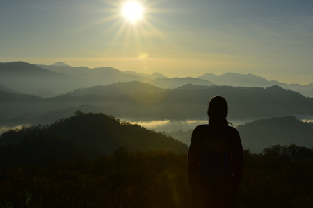 view of the sky, mist, mountain view in the morning before dawn, looking up from the peak. Sunrise in the morning at the high hill.の写真素材