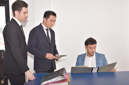 Young businessmen man Talk to a good meeting. Smile to each otherの写真素材