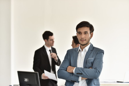 Young businessmen man Talk to a good meeting. Smile to each otherの写真素材