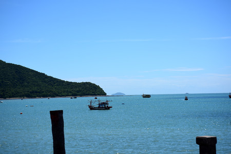Sea view and small boat At the fishing pier and small fishing boat You can see the hotel building. Pattaya Beach and Jomtien Beach Thai life at Sattahip, Chonburi View on port of bangsare fishing pier with small fishing boatsのeditorial素材