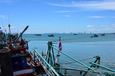 Sea view and small boat At the fishing pier and small fishing boat You can see the hotel building. Pattaya Beach and Jomtien Beach Thai life at Sattahip, Chonburi View on port of bangsare fishing pier with small fishing boatsのeditorial素材