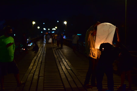 Cambodia, Siem Reap 12/06/2019 People walking on the bridge at nightの写真素材