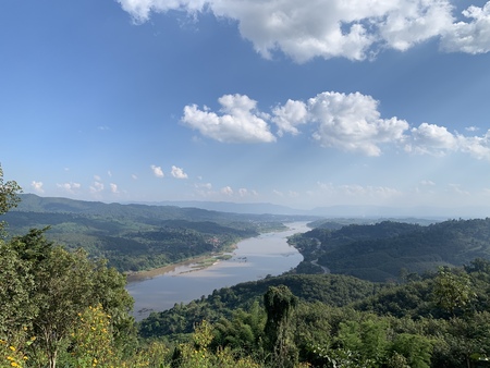 The atmosphere of the mountain and long river under the bright skyの写真素材