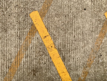 concrete floor with yellow line as natural background and wallpaper, classic old styleの写真素材