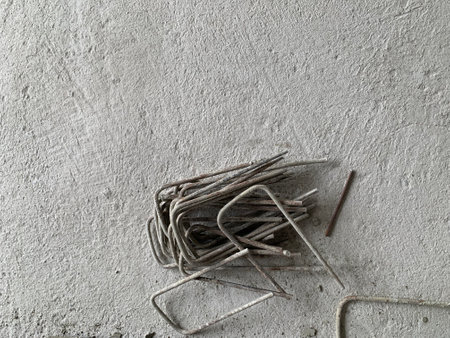 Old iron nails on a concrete background. Construction concept. Copy space.の写真素材