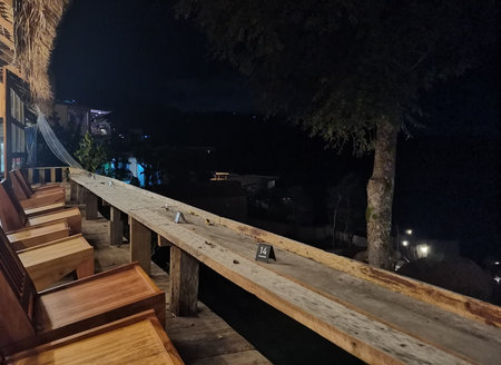 Wooden stairs in the old town at night. Night view.