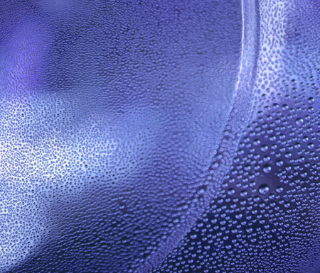 Blurry blue abstract water drops for background.の写真素材