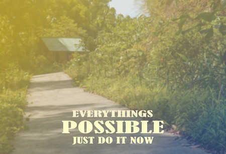Inspirational quote on blurred cottage in forest park background with vintage filter.の写真素材